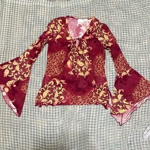 Xhilaration neck-tie w/ flare sleeves. Floral and paisley design. Worn twice.